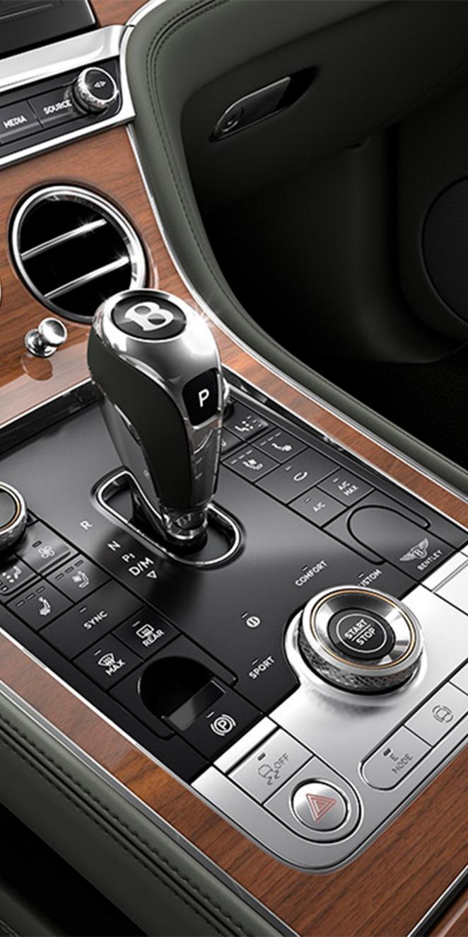 Close up of the gear lever and driver controls in the new Continental GT